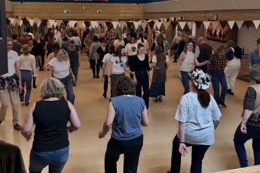 Line Dancing at the Village Hall - a roomful of people doing line dancing - Photographer Michaela Howkins